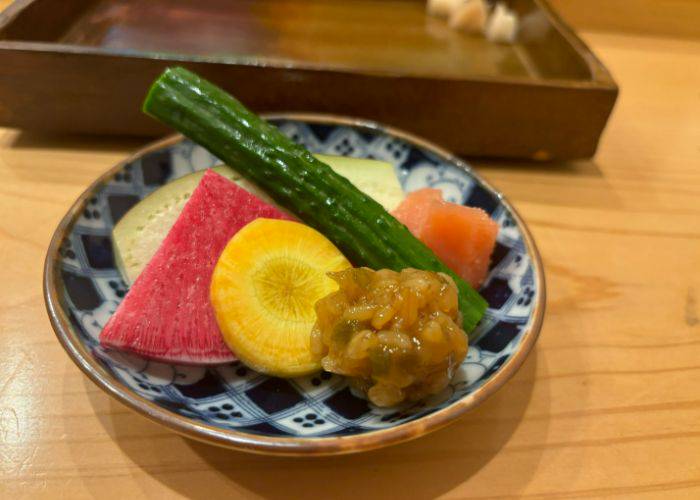 A dish of raw vegetables at Sushi Tenkawa, bursting with vibrant color.